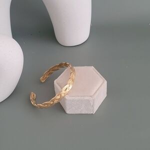 Stainless steel gold tone braided cuff bracelet